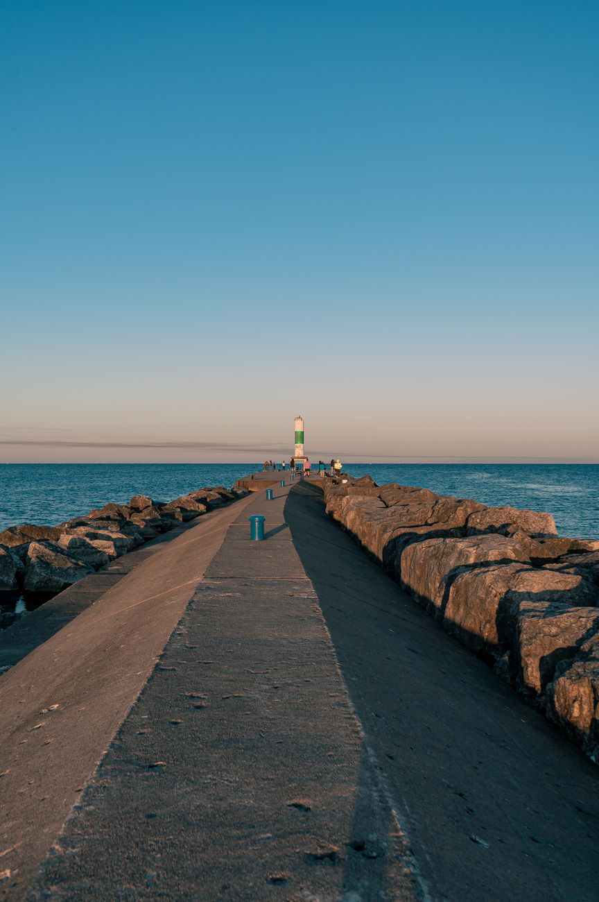 East breakwater lighthouse on Lake Michigan at dawn