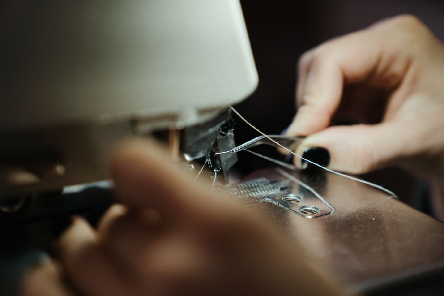Sewing machine and workbench where every quote gets read