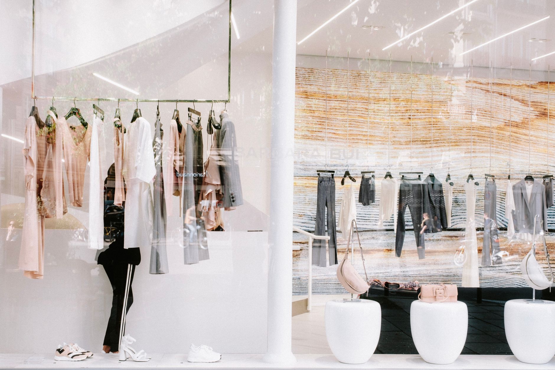 The Passive Apparel shop floor — racked garments inside the Oak Street storefront