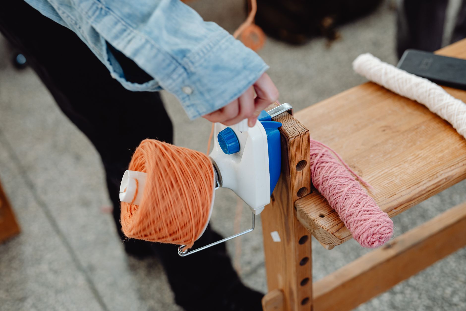 Cones of merino and combed cotton yarn in the yarn stores